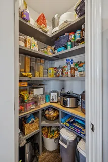 a room with lots of different kinds of food
