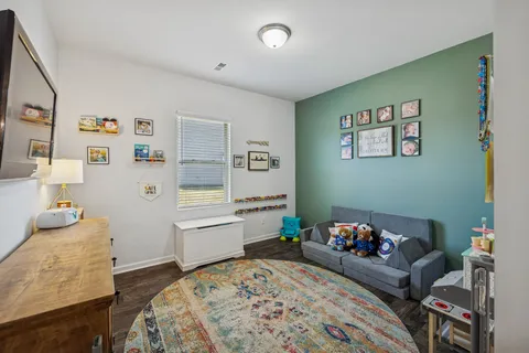 a bedroom with furniture and a bed