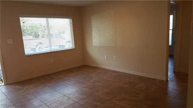 an empty room with a window