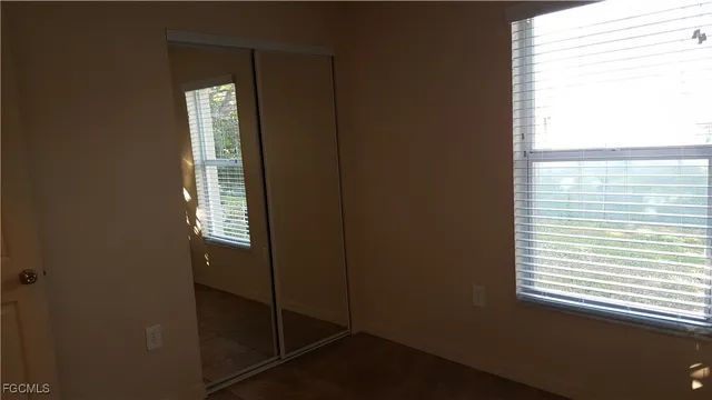 a bathroom that has a window in it
