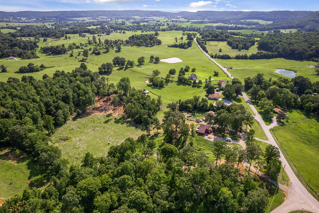 2711 Sullivan Knowles Road Sparta, TN 38583 - Photo 18 of 42 an aerial view of a residential houses with outdoor space and trees