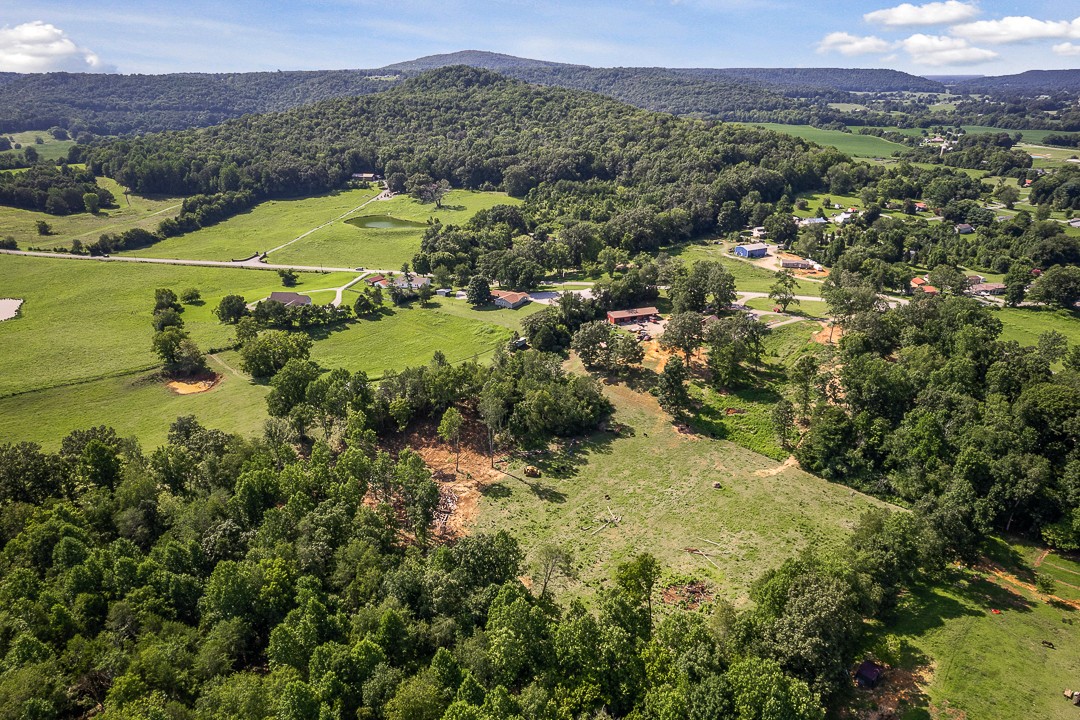 2711 Sullivan Knowles Road Sparta, TN 38583 - Photo 19 of 42 a view of a lush green hillside and houses