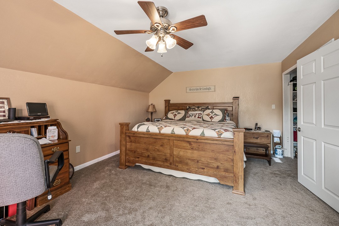 2711 Sullivan Knowles Road Sparta, TN 38583 - Photo 27 of 42 a bed room with a bed and a chair
