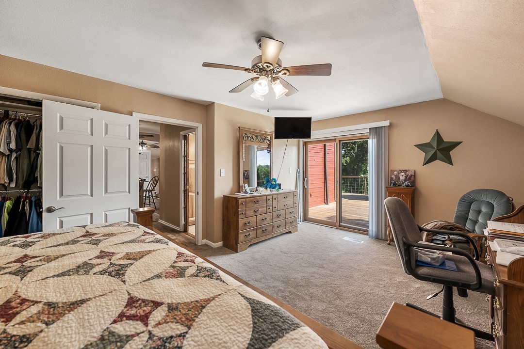 2711 Sullivan Knowles Road Sparta, TN 38583 - Photo 28 of 42 a bedroom with a bed a desk and chair