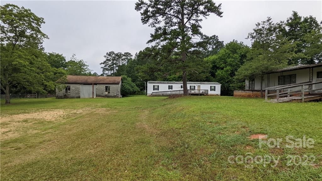 1351 Liberty Road Chester, SC 29706 - Photo 2 of 28 a view of a house with a yard and sitting area