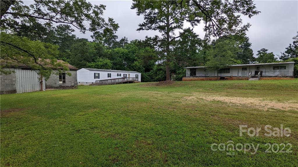 1351 Liberty Road Chester, SC 29706 - Photo 3 of 28 a view of a house with a yard and sitting area