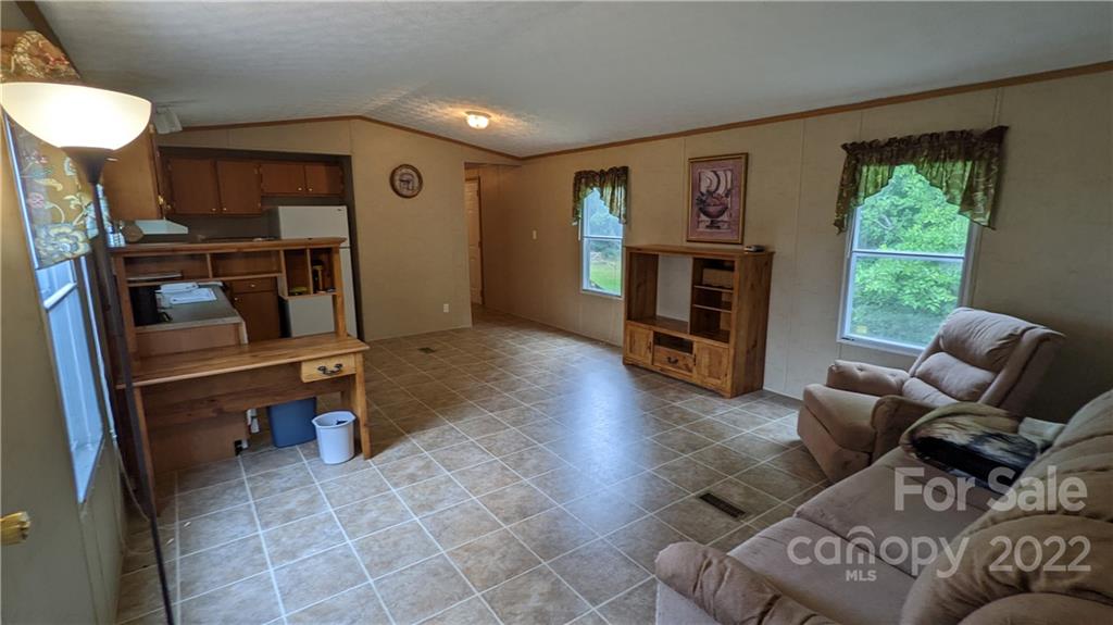 1351 Liberty Road Chester, SC 29706 - Photo 7 of 28 a living room with furniture and a fireplace