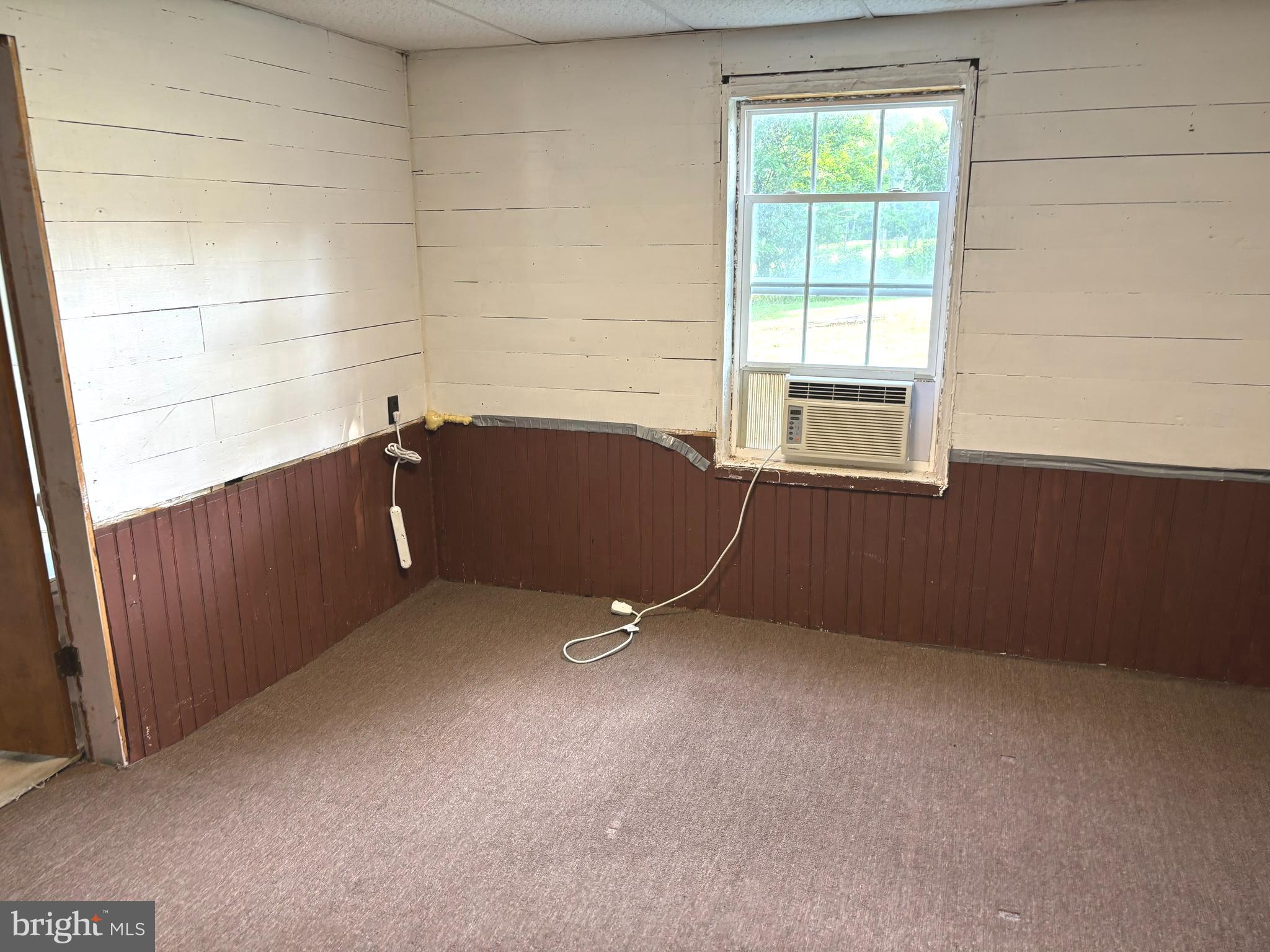 2600 Middle Cove Road Mathias, WV 26812 - Photo 21 of 30 an empty room with windows