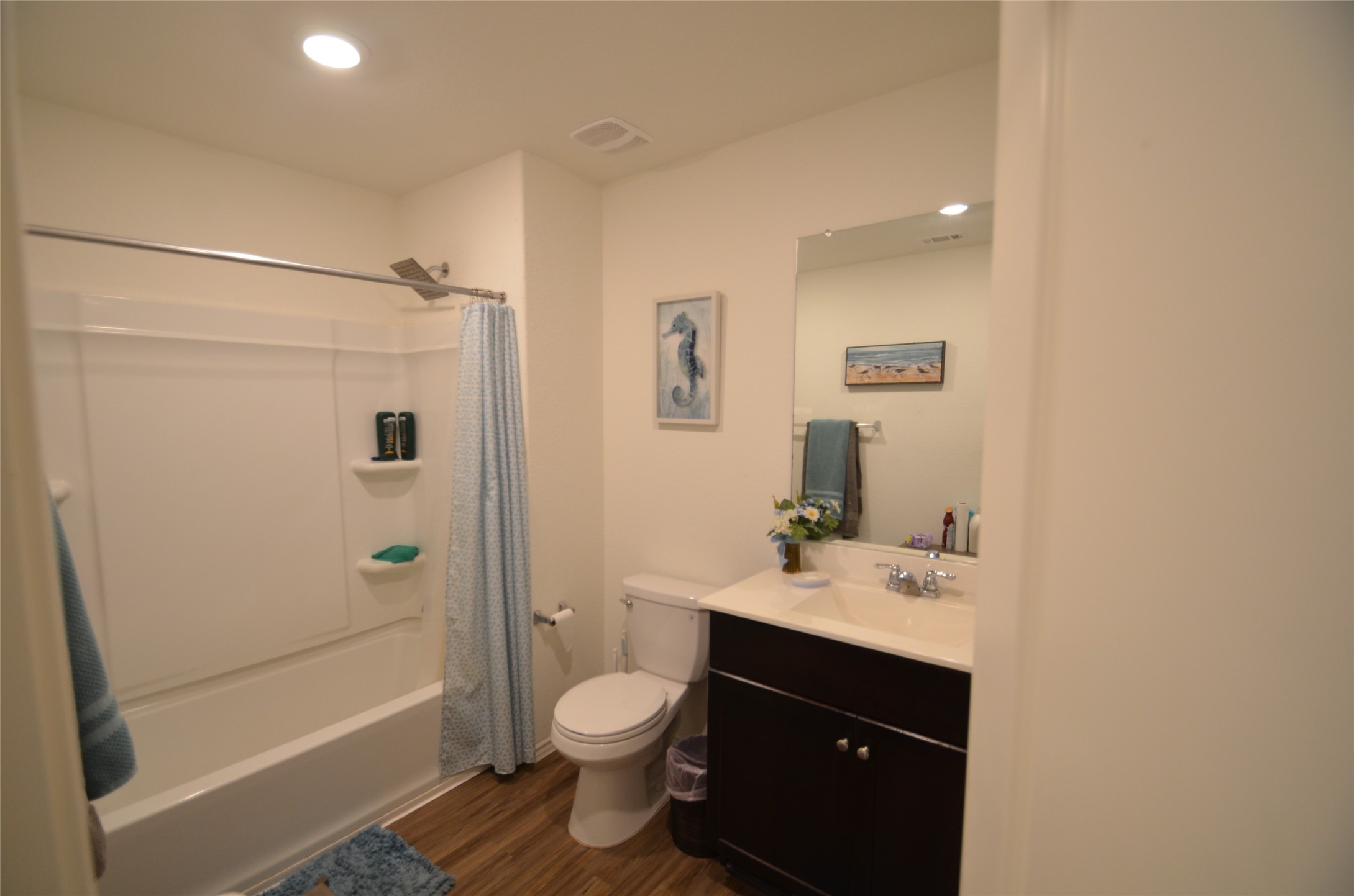13706 Mussel Run Elgin, TX 78621 - Photo 15 of 34 a bathroom with a sink a toilet and shower