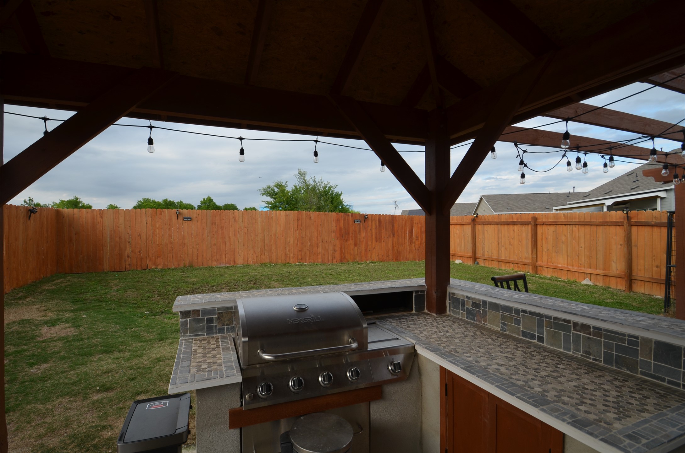 13706 Mussel Run Elgin, TX 78621 - Photo 26 of 34 a view of outdoor space with seating area