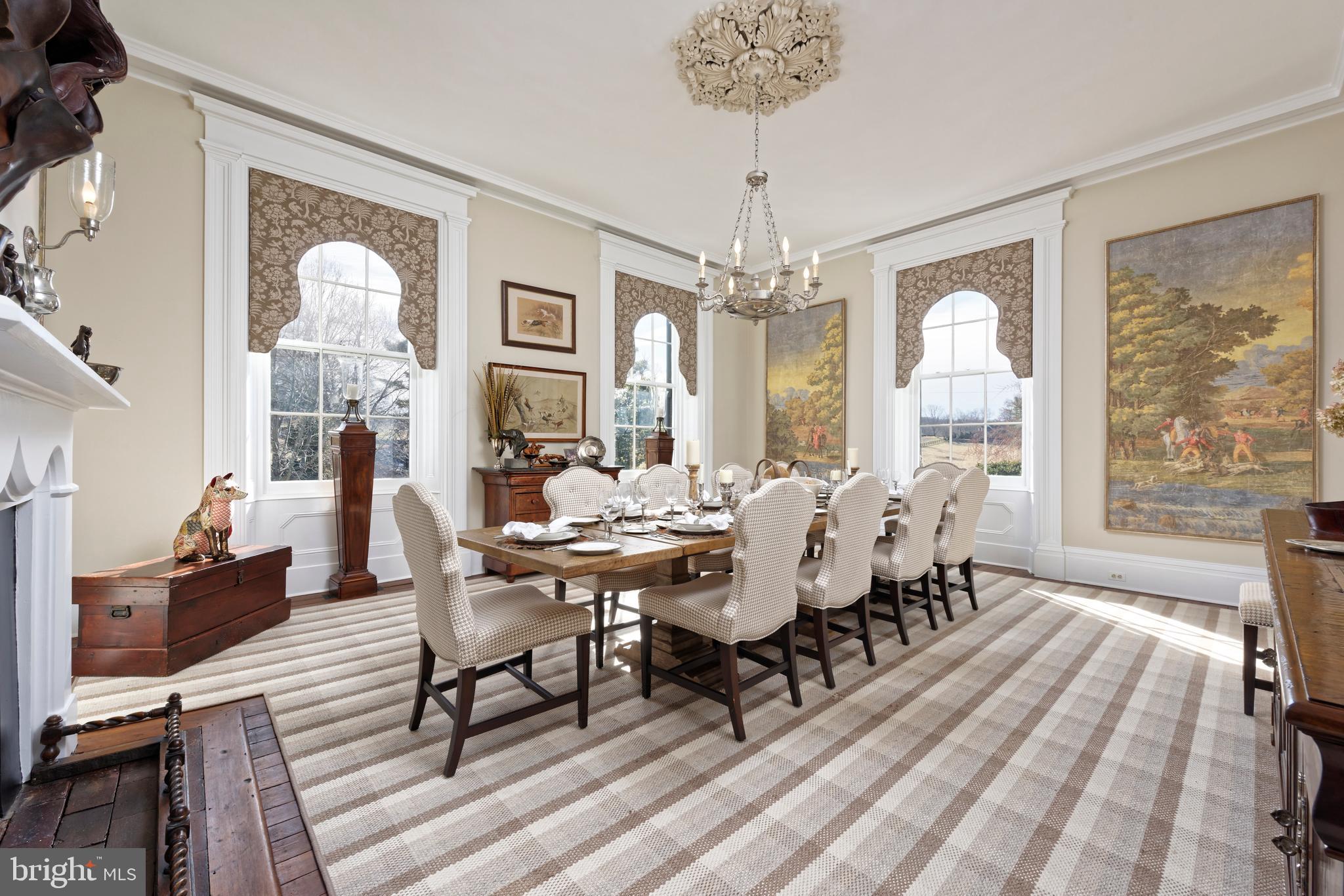 7064 Young Road The Plains, VA 20198 - Photo 18 of 89 a view of a dining room with furniture wooden floor and chandelier
