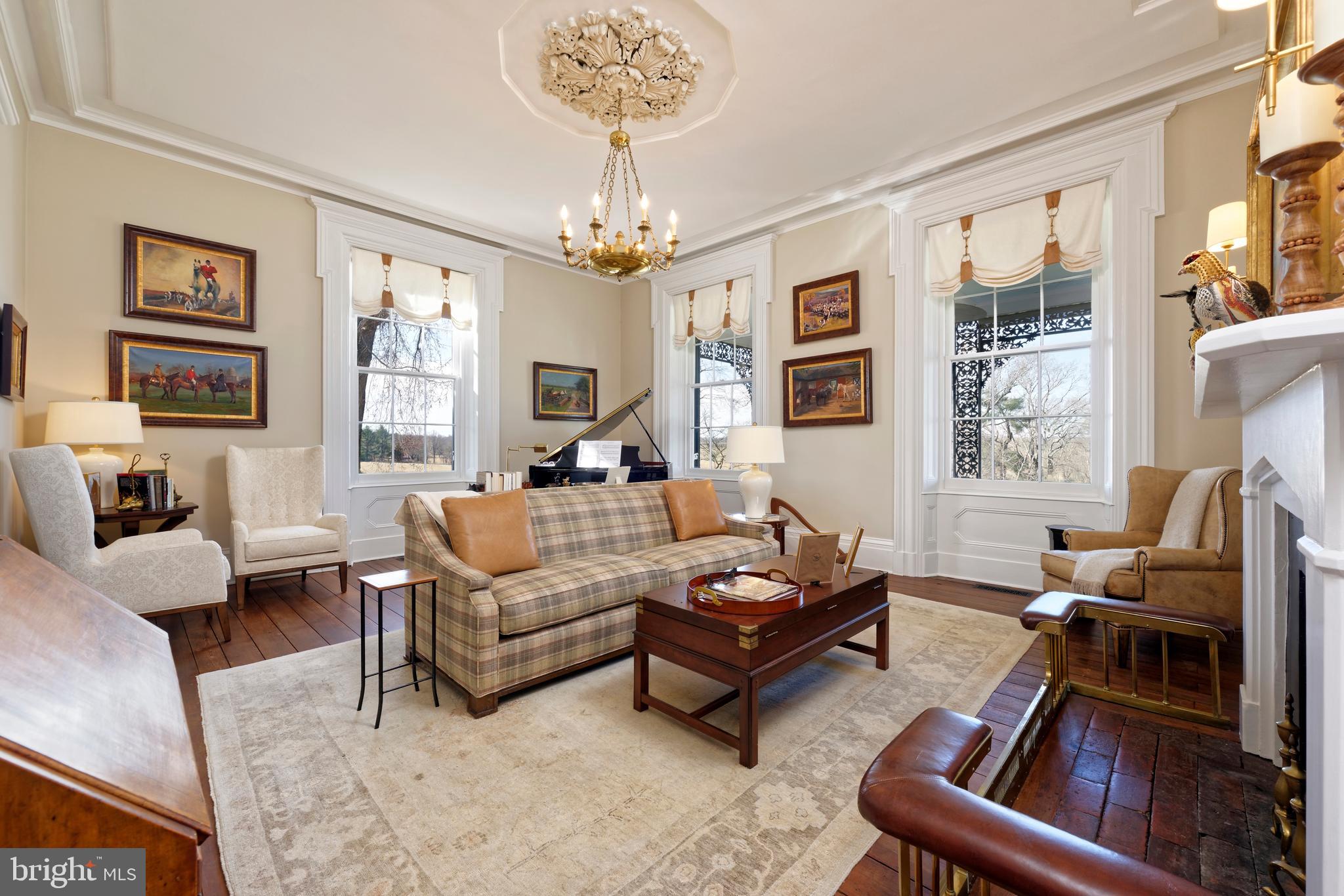 7064 Young Road The Plains, VA 20198 - Photo 19 of 89 a living room with furniture chandelier and a window
