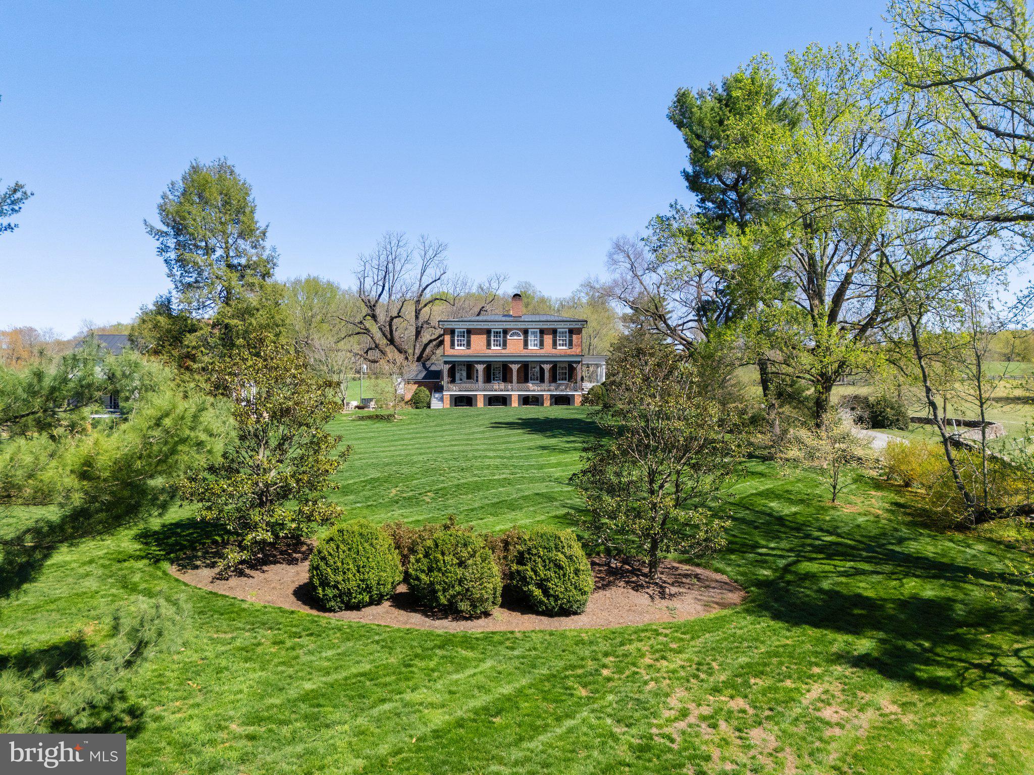 7064 Young Road The Plains, VA 20198 - Photo 3 of 89 a view of a garden with a house in the background