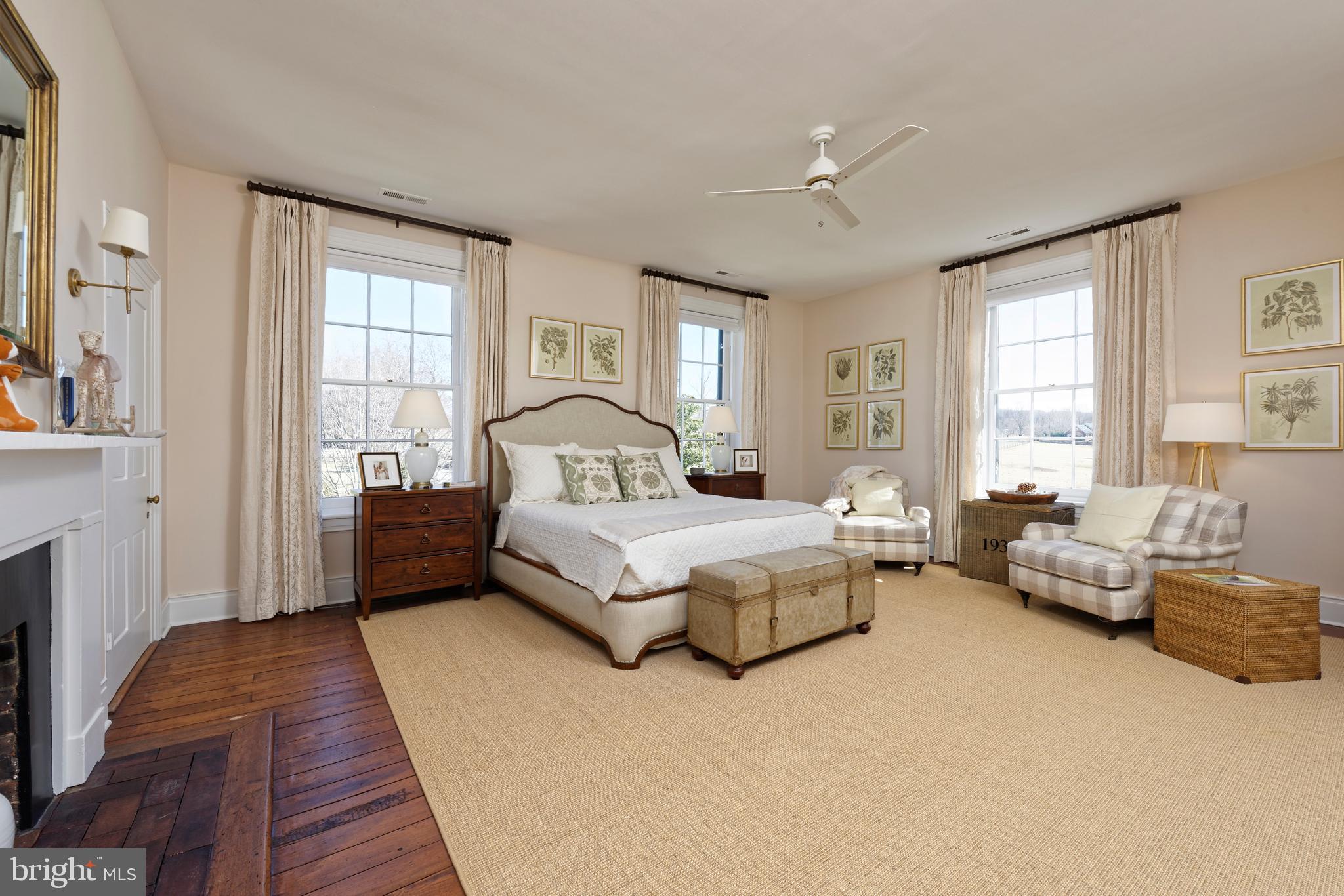 7064 Young Road The Plains, VA 20198 - Photo 34 of 89 a bedroom with a bed couch and a window