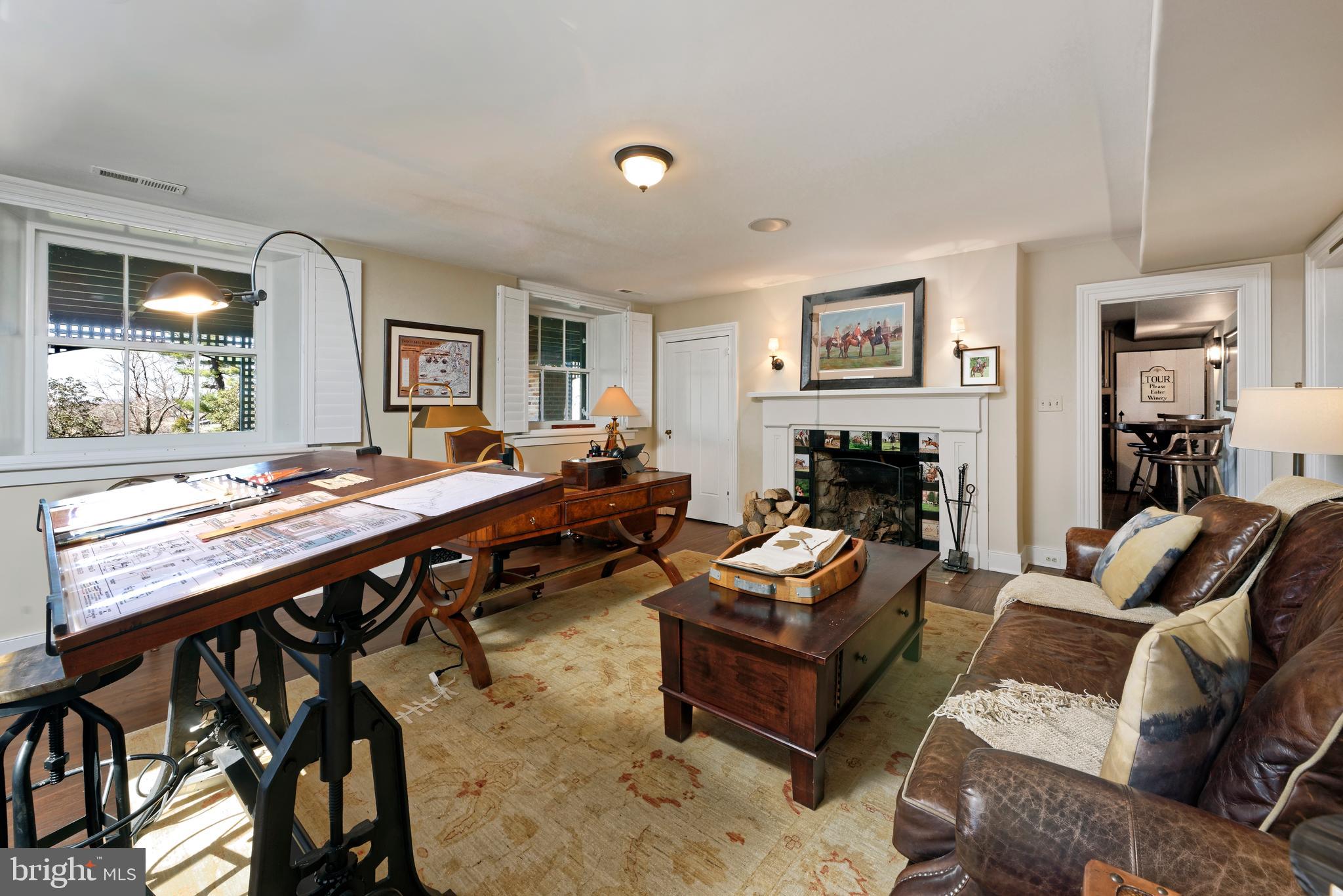 7064 Young Road The Plains, VA 20198 - Photo 38 of 89 a living room with furniture and a wooden floor