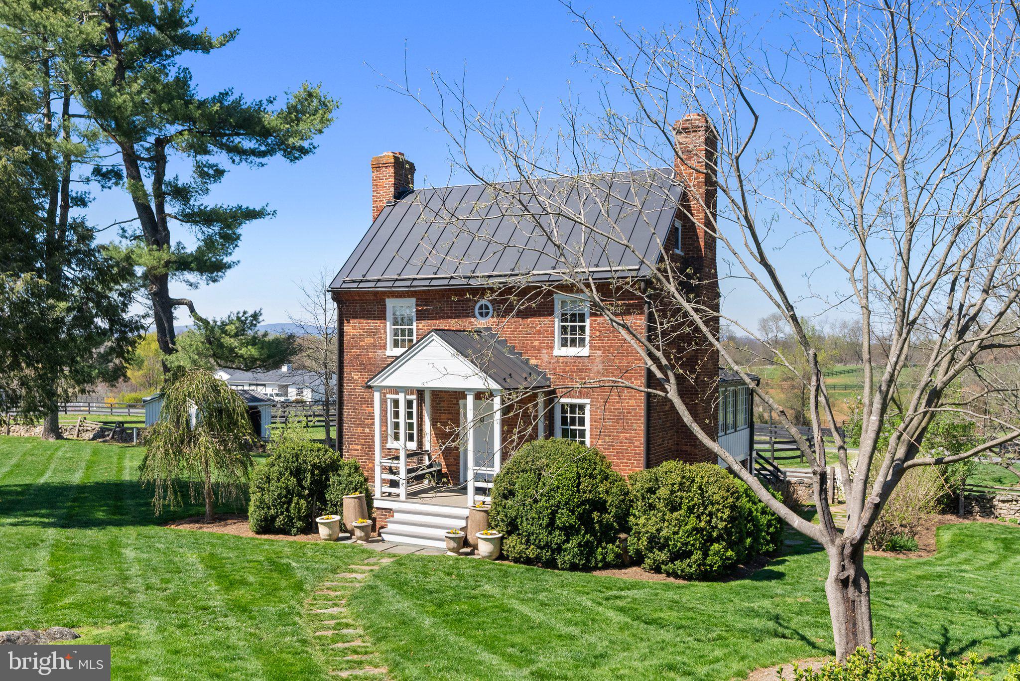 7064 Young Road The Plains, VA 20198 - Photo 49 of 89 a front view of a house with a yard