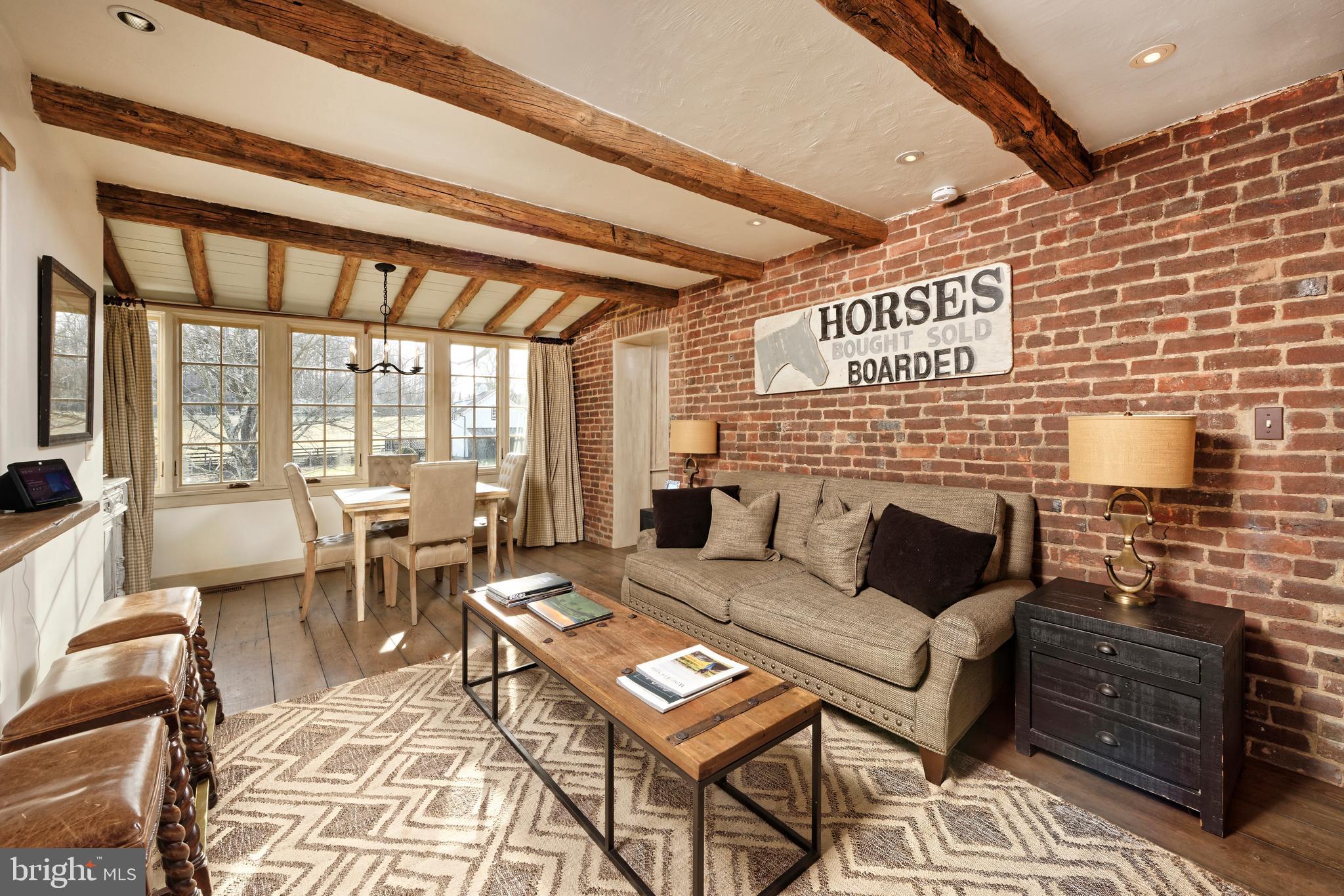 7064 Young Road The Plains, VA 20198 - Photo 55 of 89 a living room with furniture and a fireplace