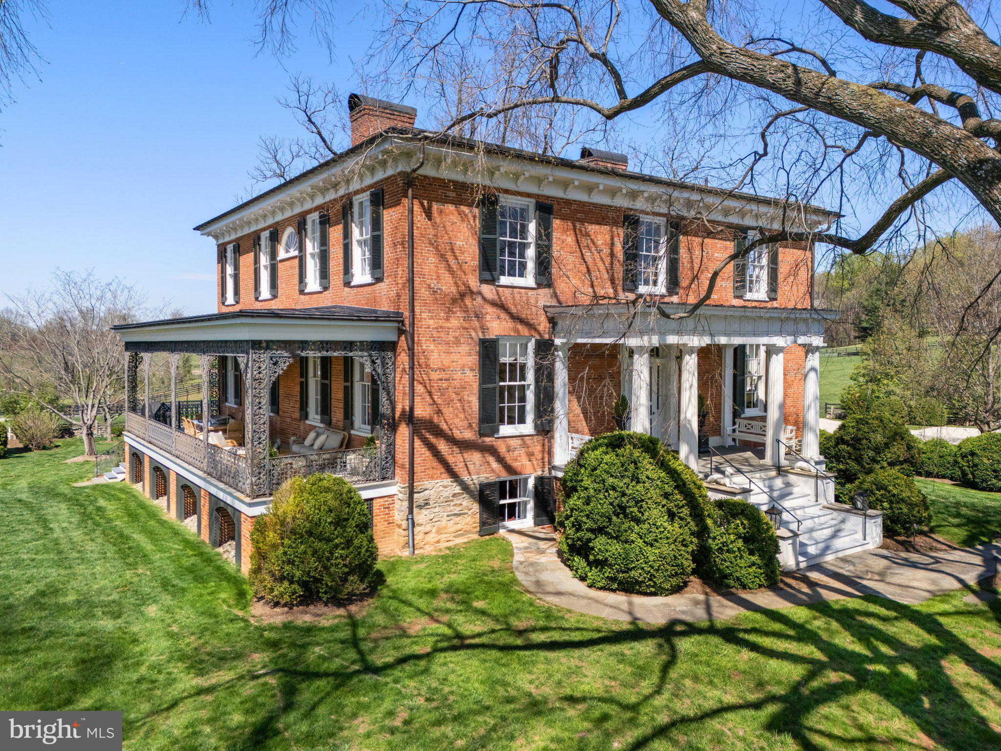 7064 Young Road The Plains, VA 20198 - Photo 69 of 89 a front view of a house with garden