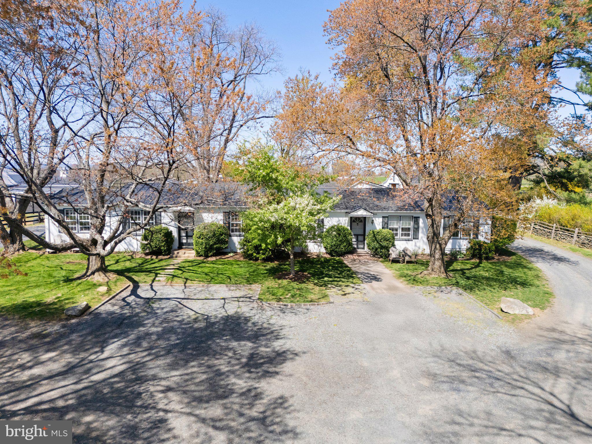7064 Young Road The Plains, VA 20198 - Photo 72 of 89 a view of a house with a yard and sitting area