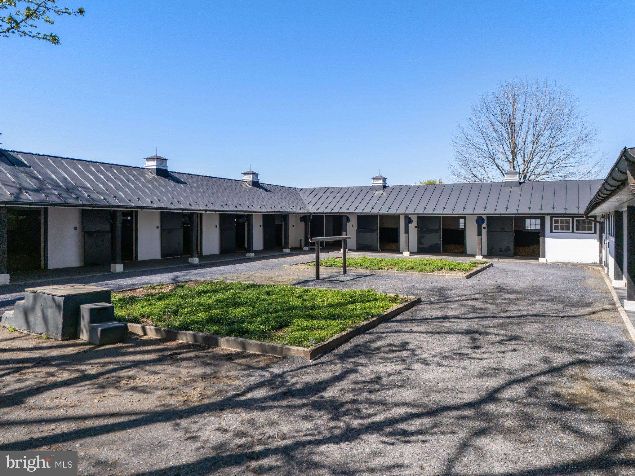 7064 Young Road The Plains, VA 20198 - Photo 73 of 89 a view of a house with backyard and sitting area