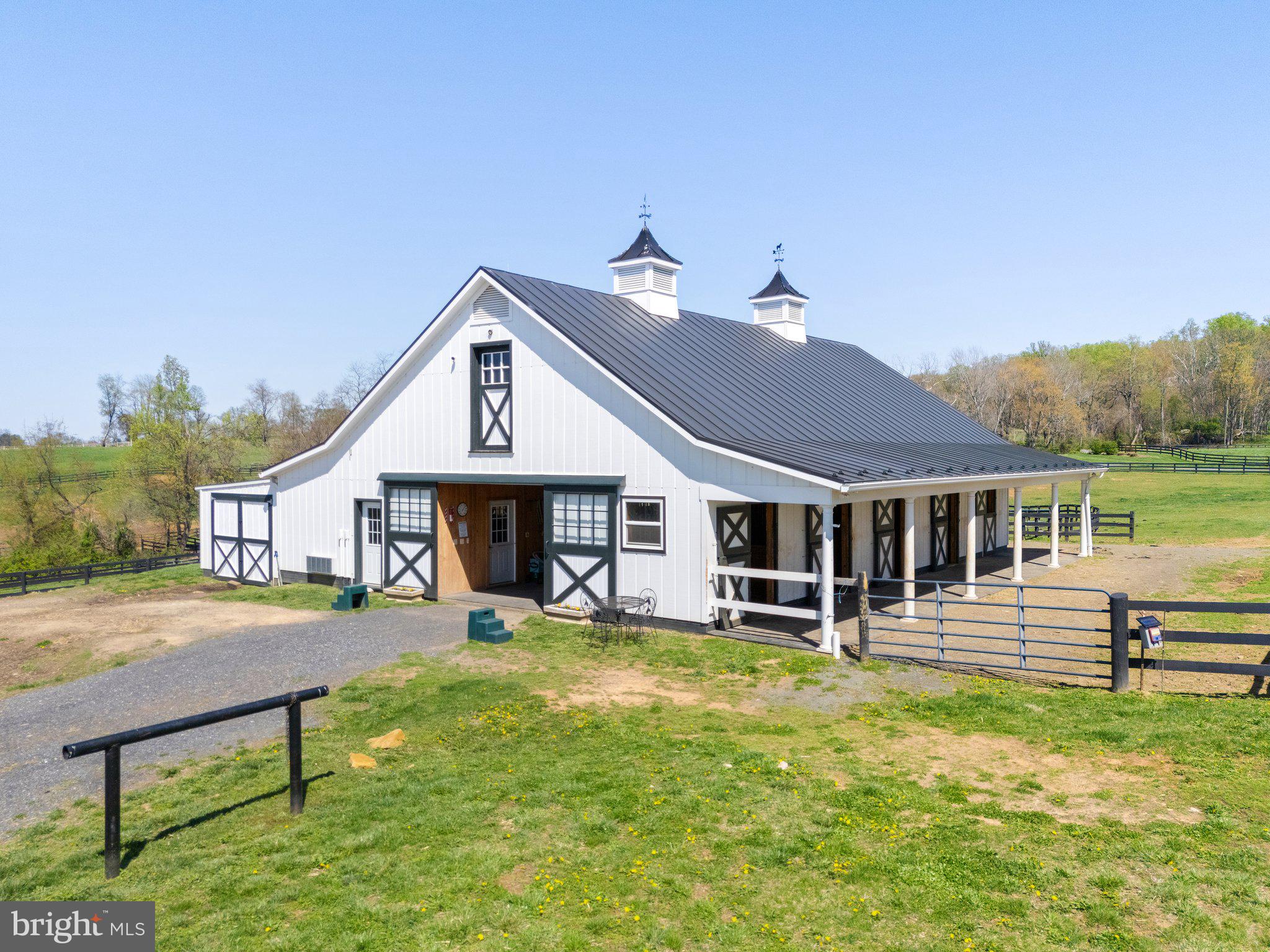 7064 Young Road The Plains, VA 20198 - Photo 76 of 89 a front view of a house with garden