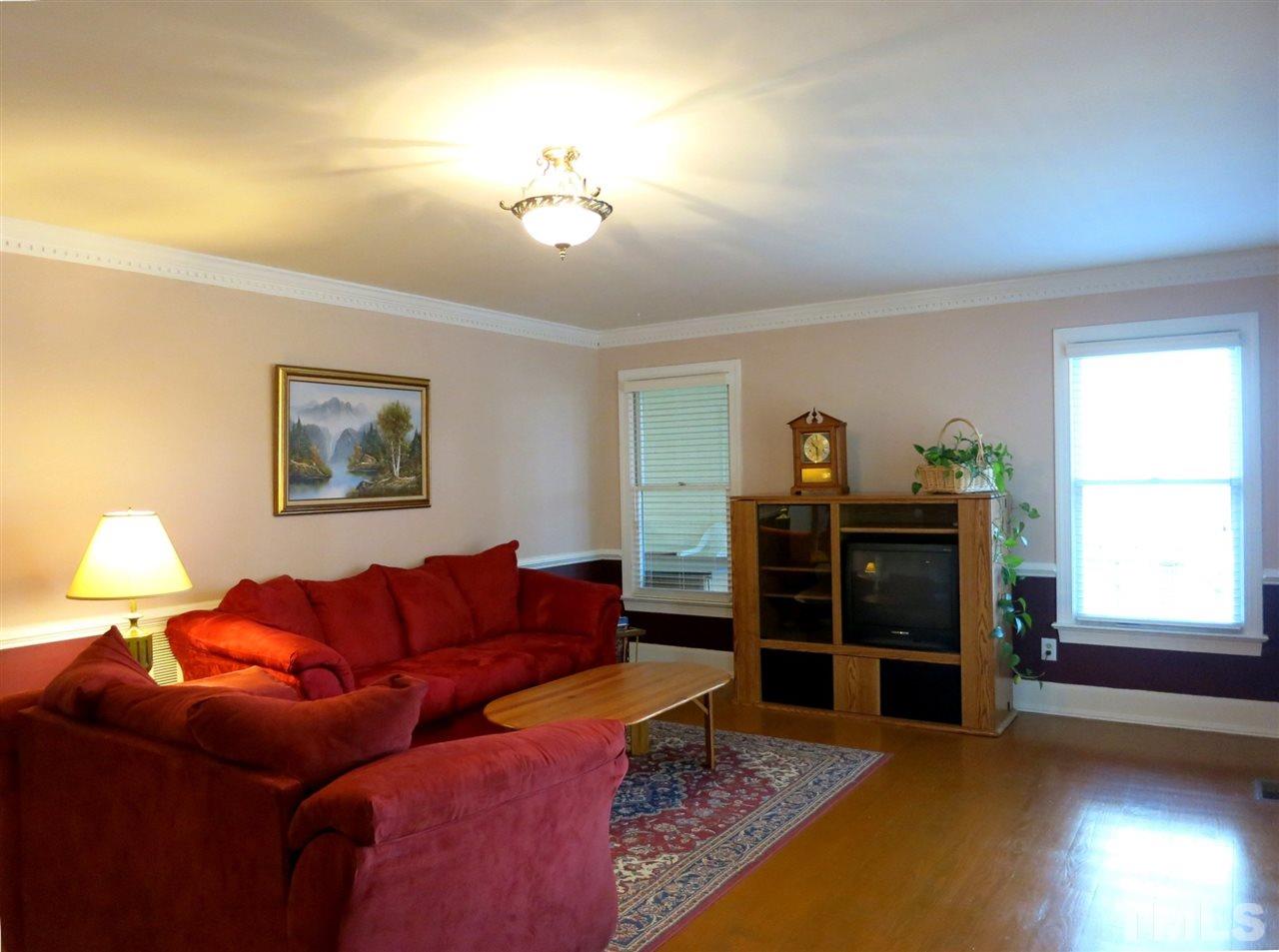 4300 Quarry Road Zebulon, NC 27597 - Photo 3 of 25 a living room with furniture and window