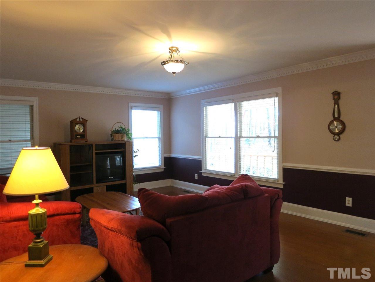 4300 Quarry Road Zebulon, NC 27597 - Photo 4 of 25 a living room with furniture and a window