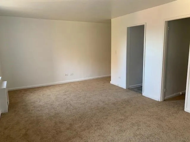 an empty room with an entryway