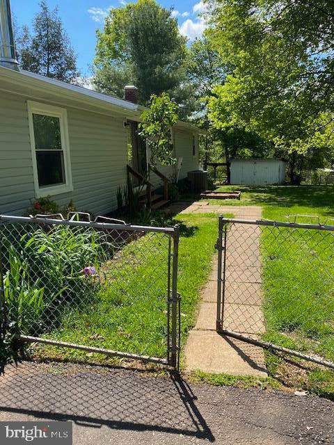 9554 Meetze Road Midland, VA 22728 - Photo 2 of 39 Fully Fenced Backyard with Shed and room for pets