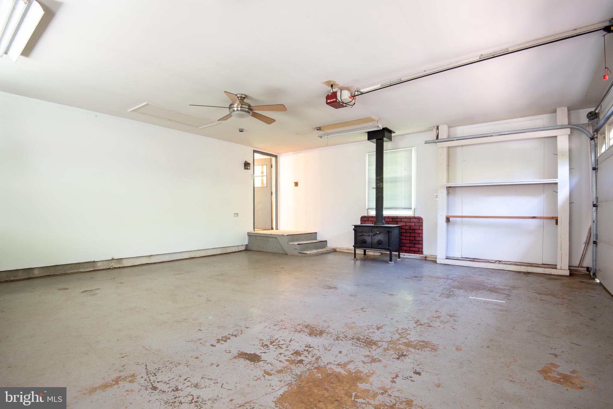 9554 Meetze Road Midland, VA 22728 - Photo 16 of 39 Oversized Garage w woodstove and room for workshop