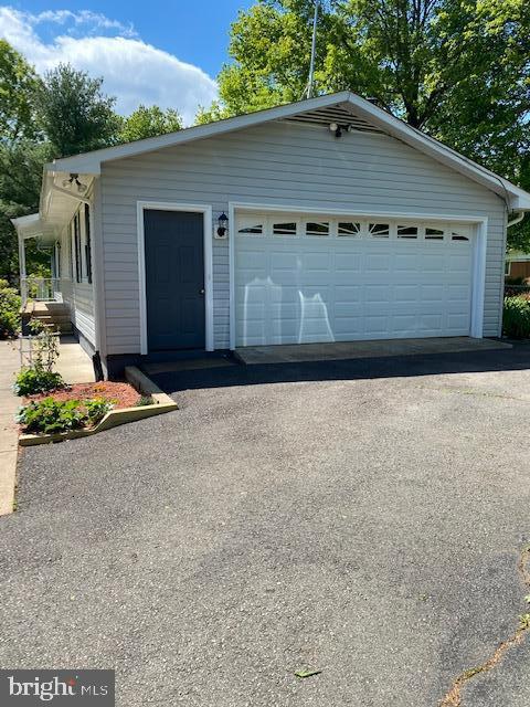 9554 Meetze Road Midland, VA 22728 - Photo 3 of 39 Oversized 2 car garage w woodstove & workshop area