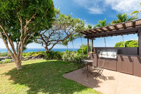 a view of a backyard with a patio