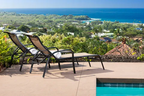 a view of a chairs and table on the terrace
