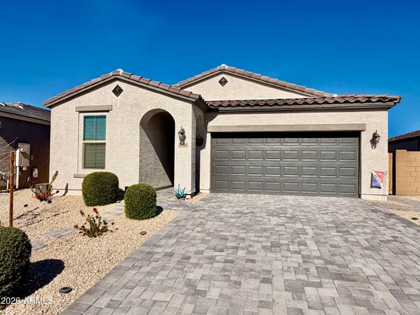 a front view of a house with outdoor space
