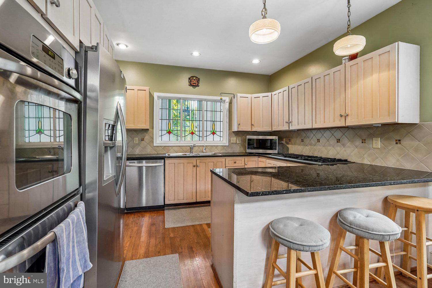 16 Maple Avenue Washington Grove, MD 20880 - Photo 21 of 58 Charming kitchen with stained glass accents.