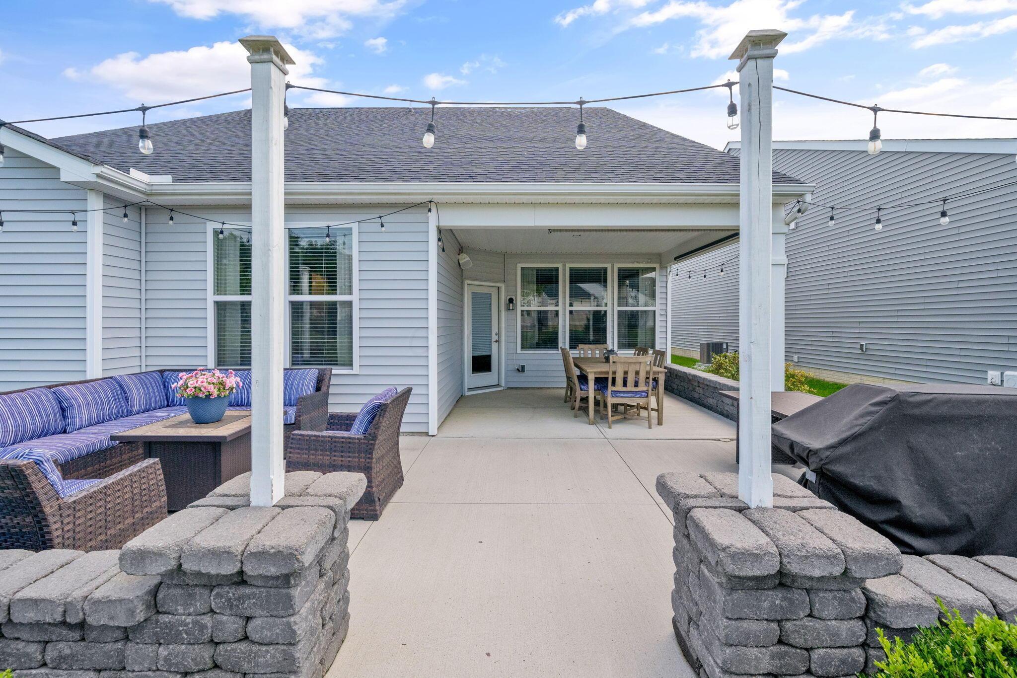 727 Fescue Road Galena, OH 43021 - Photo 62 of 85 The patio is surrounded by stone retaining walls.