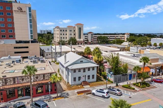 a view of city with tall buildings