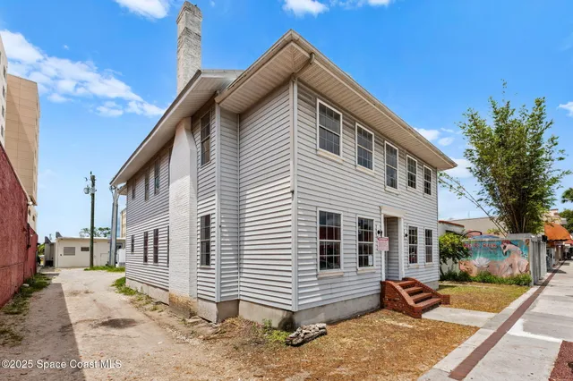 a view of a house with a patio