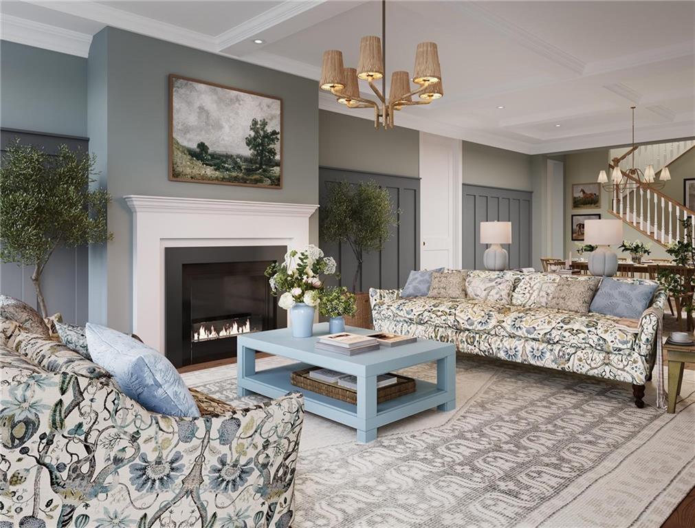 102 Ramsgate Road, Unit CONWAY Cranberry Township, PA 16066 - Photo 11 of 42 a living room with furniture a fireplace and a chandelier