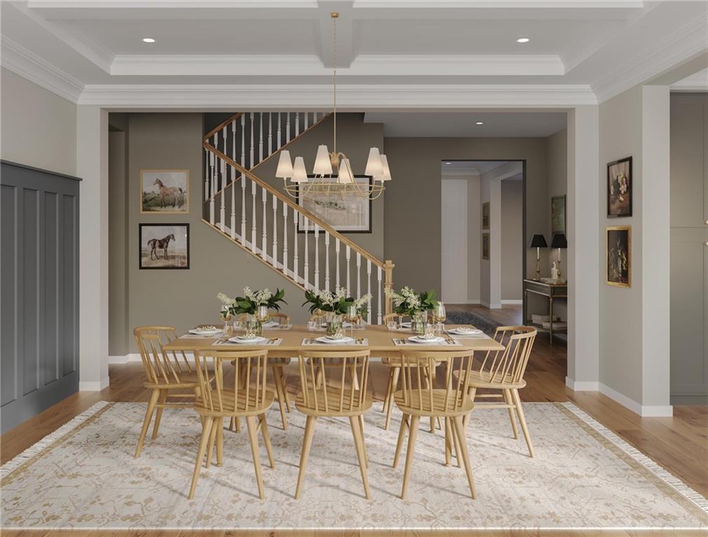 102 Ramsgate Road, Unit CONWAY Cranberry Township, PA 16066 - Photo 13 of 42 a view of a dining room with furniture and wooden floor