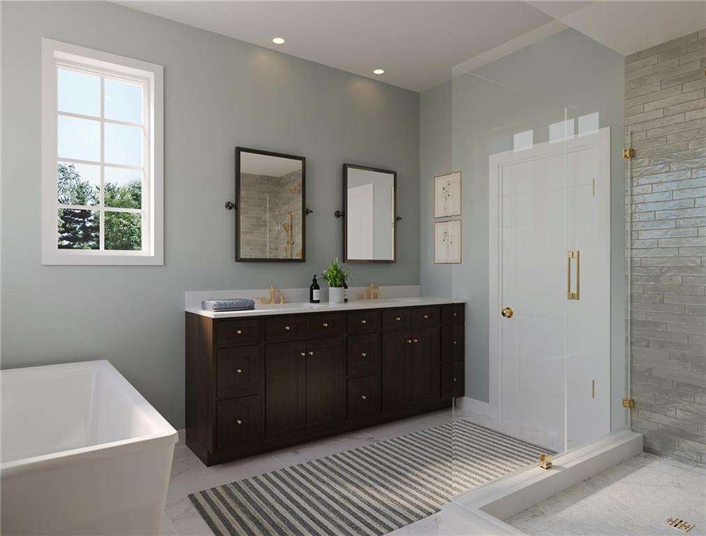 102 Ramsgate Road, Unit CONWAY Cranberry Township, PA 16066 - Photo 19 of 42 a spacious bathroom with a tub sink and mirror