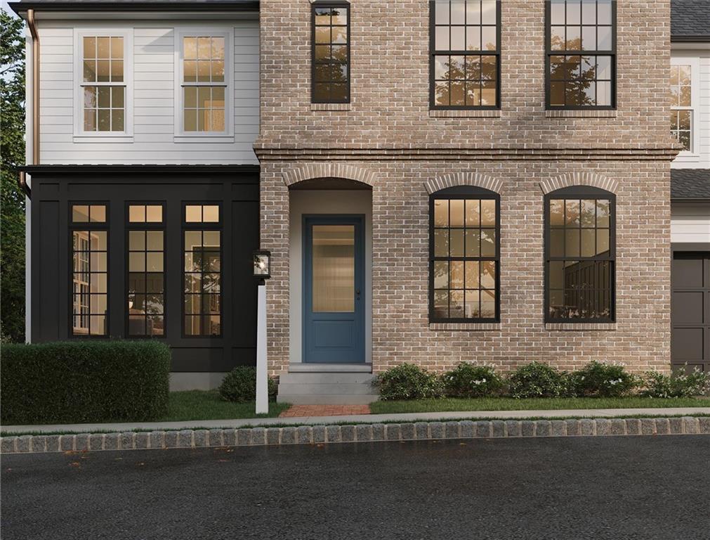 102 Ramsgate Road, Unit CONWAY Cranberry Township, PA 16066 - Photo 29 of 42 a view of a brick building next to a yard