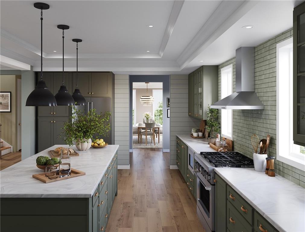102 Ramsgate Road, Unit CONWAY Cranberry Township, PA 16066 - Photo 6 of 42 a kitchen with a stove and a wooden floor