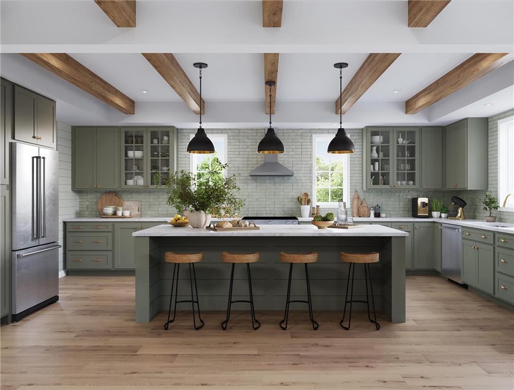 102 Ramsgate Road, Unit CONWAY Cranberry Township, PA 16066 - Photo 7 of 42 a kitchen with a sink and chairs