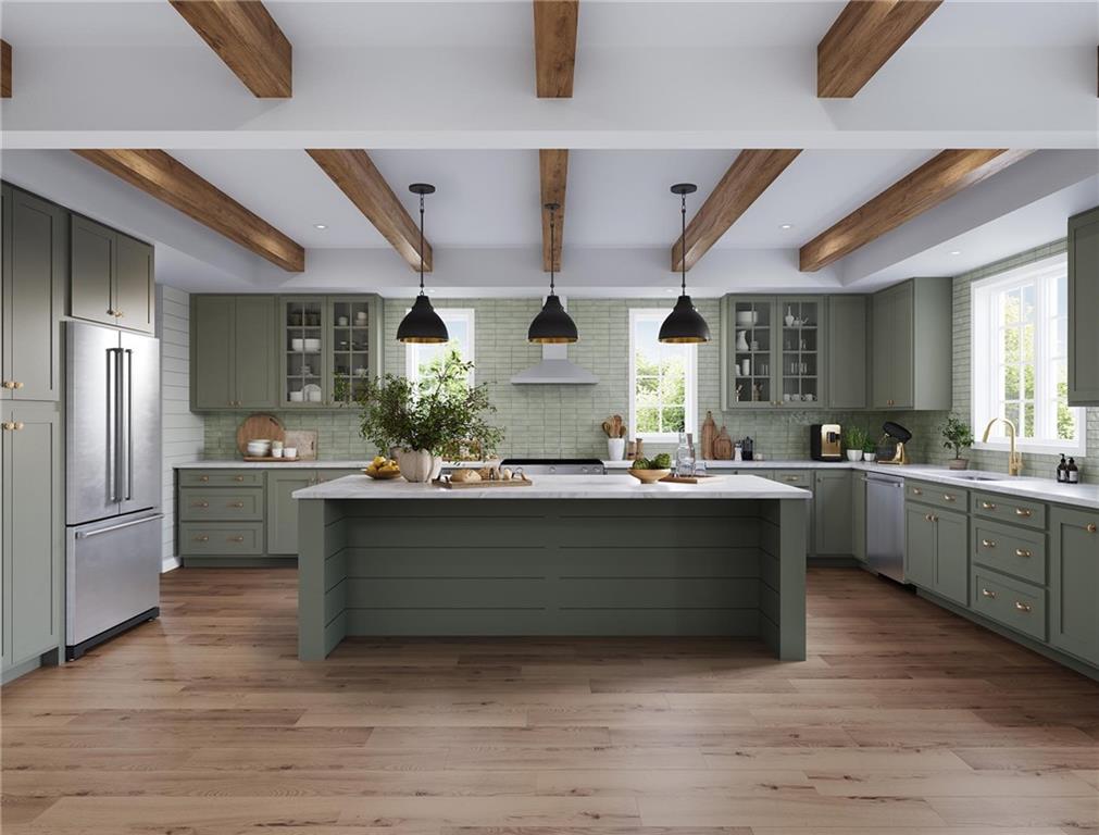 102 Ramsgate Road, Unit CONWAY Cranberry Township, PA 16066 - Photo 8 of 42 a large kitchen with stainless steel appliances wooden floor and a view of living room