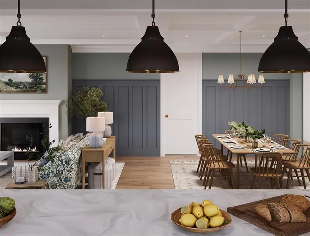 a view of a livingroom with furniture and a fireplace