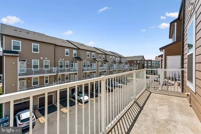 a view of a large building from a balcony