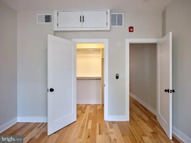 a view of bathroom with wooden floor