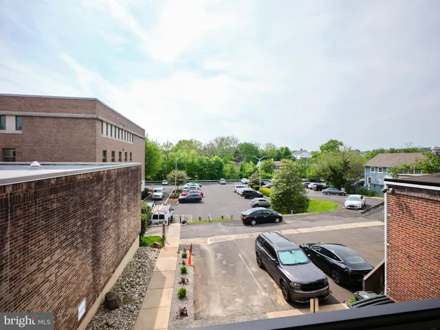a view of a patio with swimming pool
