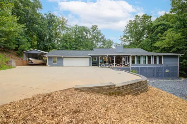 $975,000 | 7480 Shadburn Ferry Road, Cumming, GA 30041